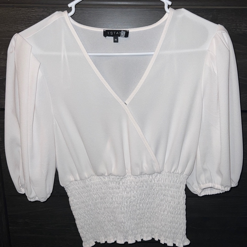 Sheer white top only worn once.